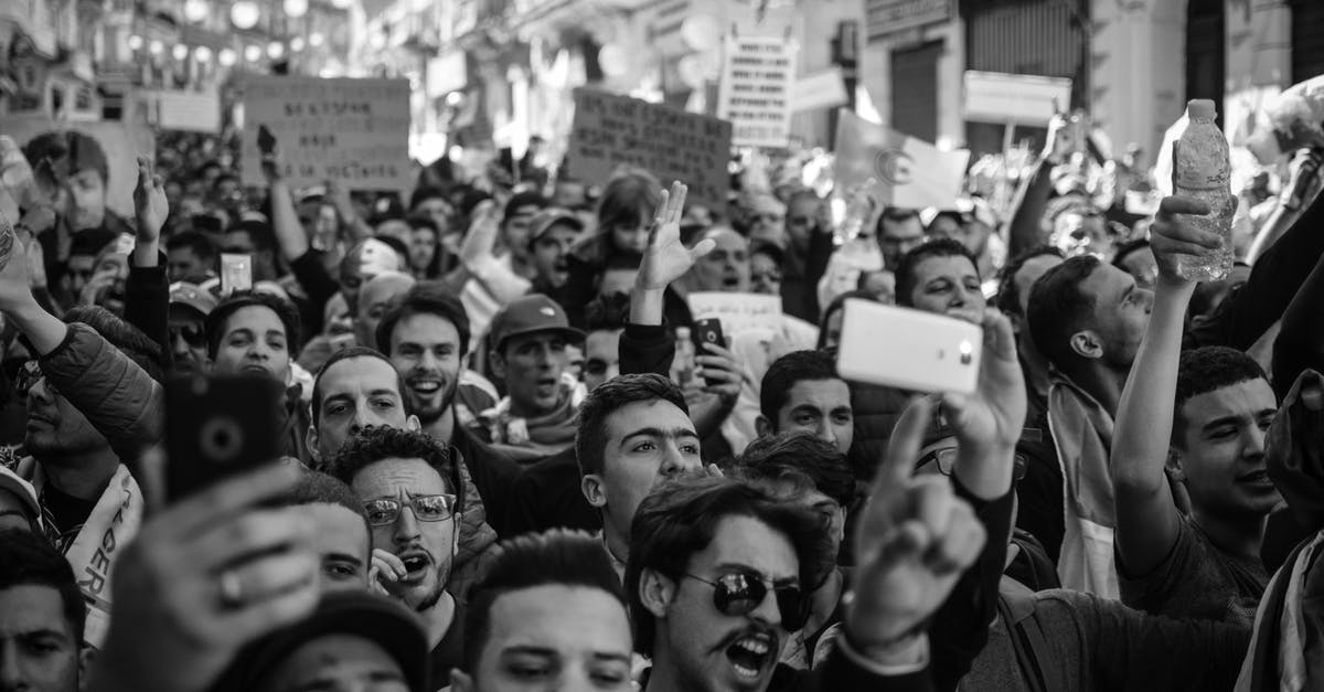 What are the visual signs of uncontaminated margarine spoilage? [closed] - Crowd of People Black and White Photo