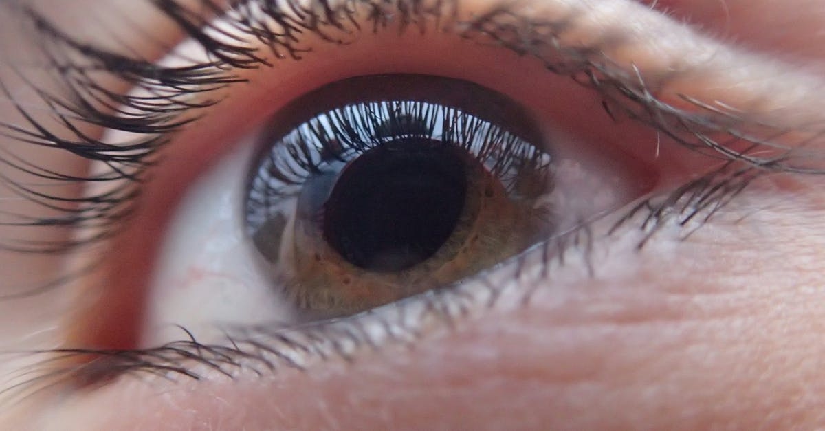 What are the visual signs of uncontaminated margarine spoilage? [closed] - Extreme Close-up of Woman Eye