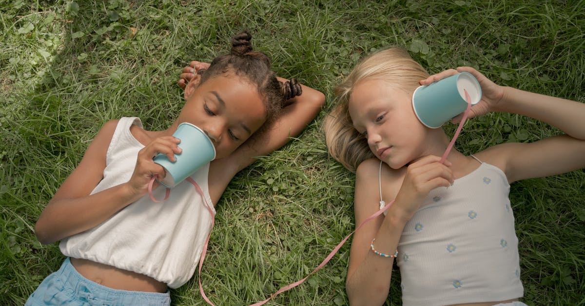 What are these two vegetables called? - Two Teenage Girls Laying on Grass and Playing Telephone Call Using Paper Cups on String What are these two vegetables called? - Two Teenage Girls Laying on Grass and Playing Telephone Call Using Paper Cups on String