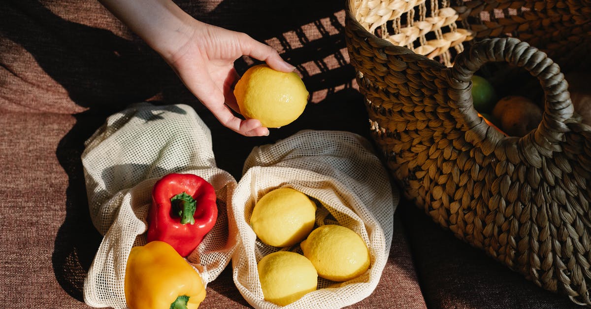 What are ways to reduce cellulose in vegetables and fruits? - Unrecognizable person near lemons and bell peppers What are ways to reduce cellulose in vegetables and fruits? - Unrecognizable person near lemons and bell peppers