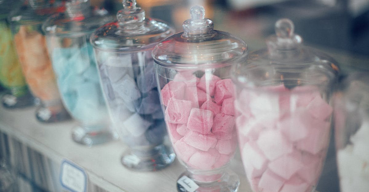 What can I mix and store Kimchi in? [duplicate] - Assortment of various multicolored sweets on counter in store