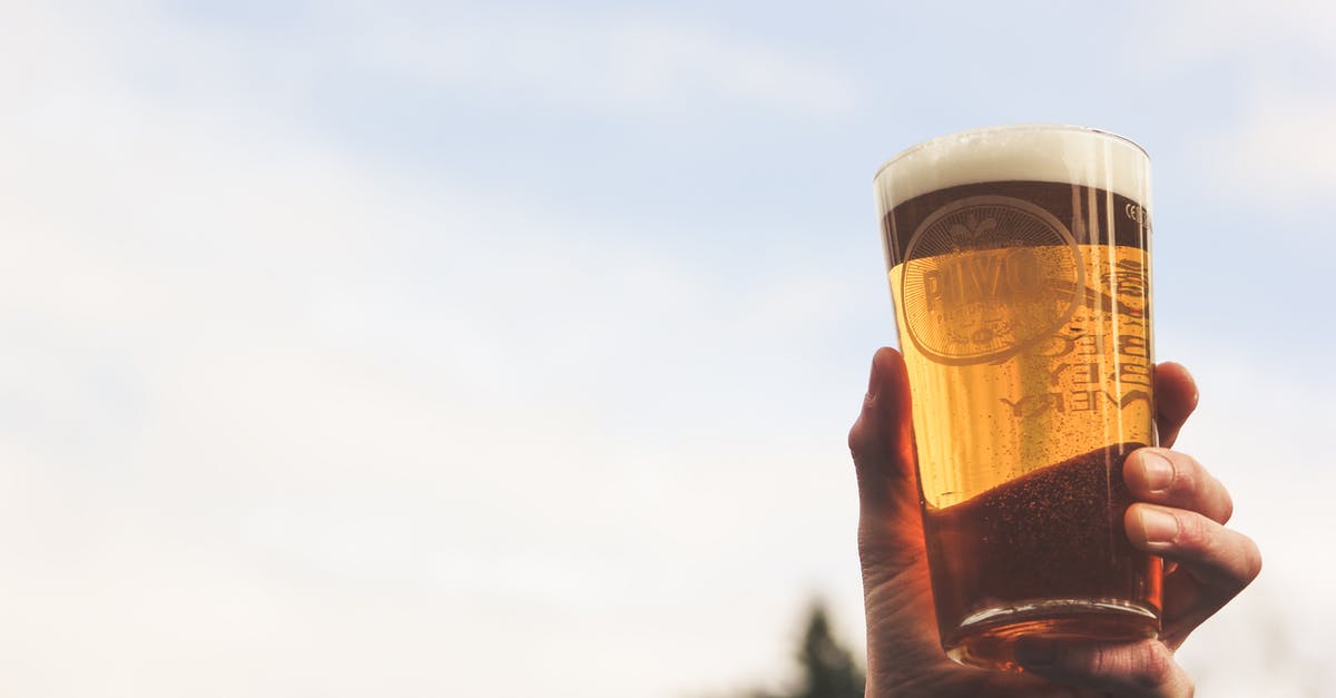 What can I substitute for lager beer in a chili recipe? [duplicate] - Close-Up Photo of Person Holding Glass of Beer
