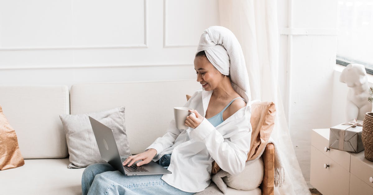 What can I use instead of a tea towel? - A Woman in a Head Towel Using her Laptop While Sitting on a Couch What can I use instead of a tea towel? - A Woman in a Head Towel Using her Laptop While Sitting on a Couch