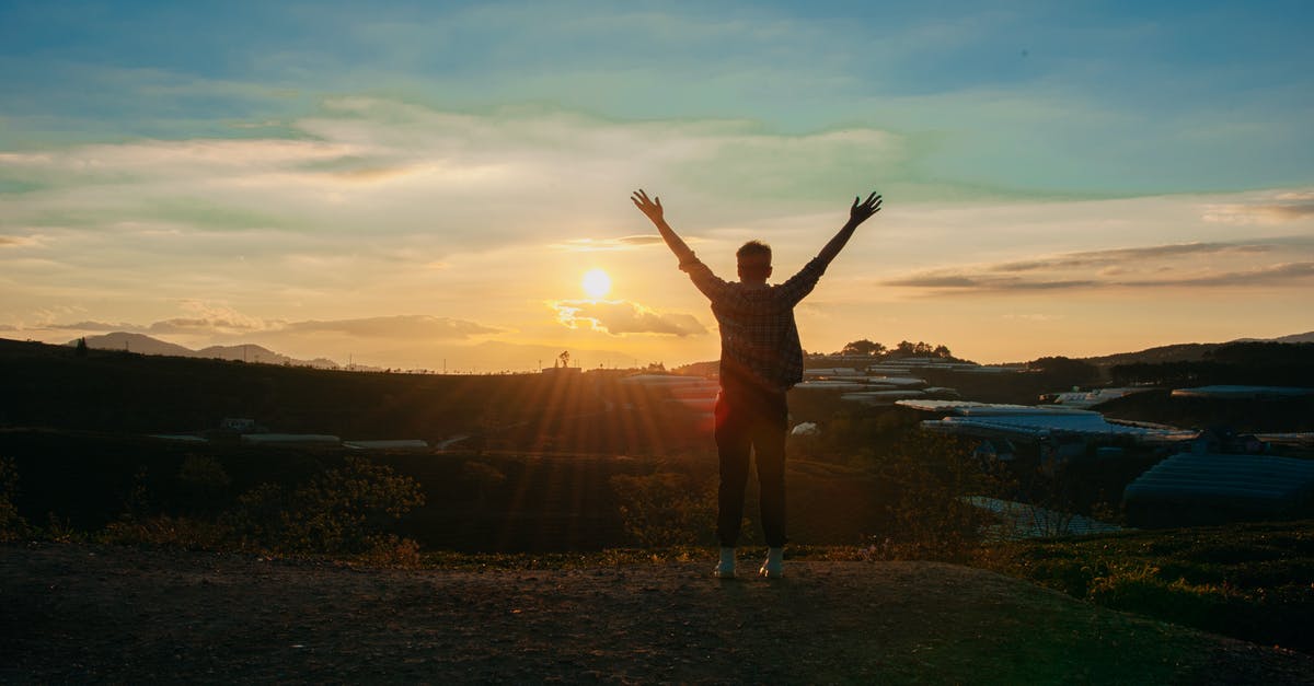 What can make a gluten free sponge light and fluffy? - Photography of Man Raising Both Hands