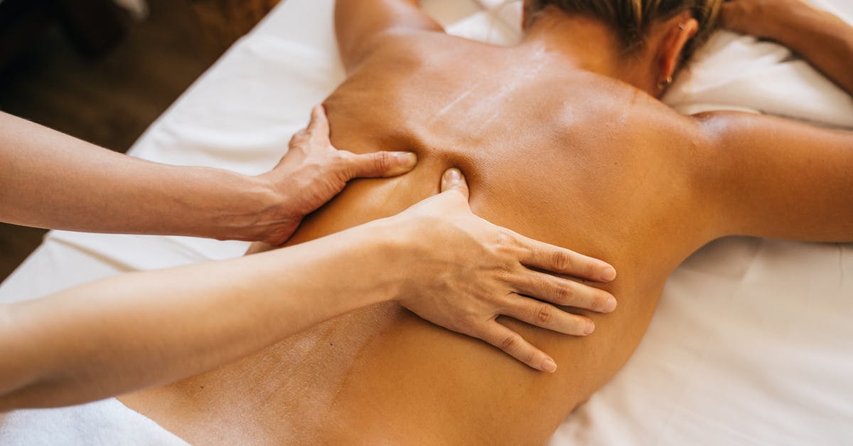 What cookbooks do you always come back to? [closed] - A Person Massaging a Client's Bare Back