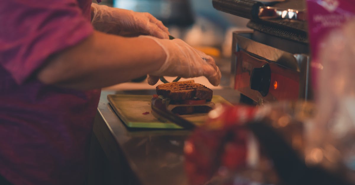 What defines a bread as 'artisan'? - Person About to Touch Bread on Tray What defines a bread as 'artisan'? - Person About to Touch Bread on Tray