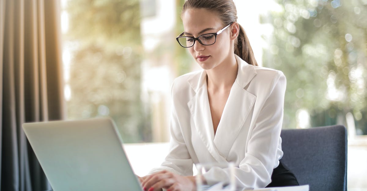 What determines total heat when using chilis? Quantity × intensity? - Concentrated female entrepreneur typing on laptop in workplace What determines total heat when using chilis? Quantity × intensity? - Concentrated female entrepreneur typing on laptop in workplace