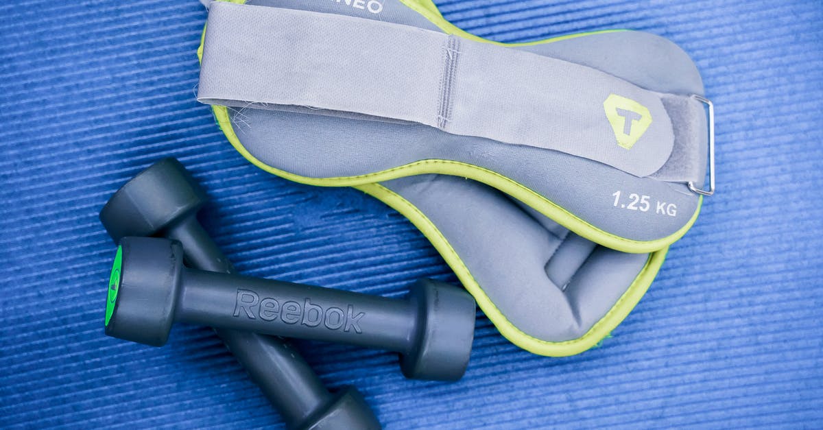 What determines whether a sherbet will set or not? - From above of modern dumbbells and leg weight belts placed on blue fitness mat in studio What determines whether a sherbet will set or not? - From above of modern dumbbells and leg weight belts placed on blue fitness mat in studio