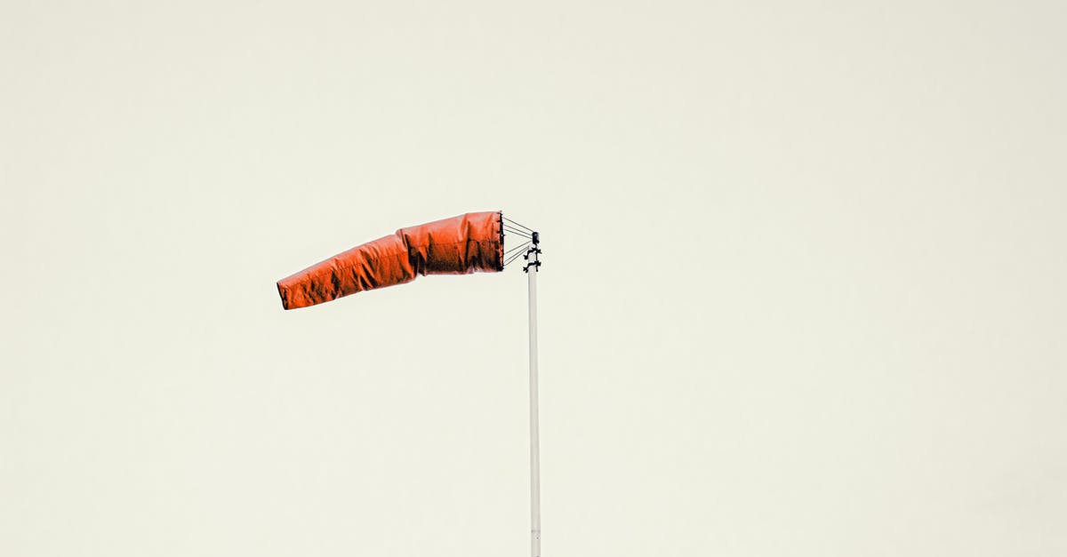 What determines whether a sherbet will set or not? - Red windsock on pole against gray sky What determines whether a sherbet will set or not? - Red windsock on pole against gray sky