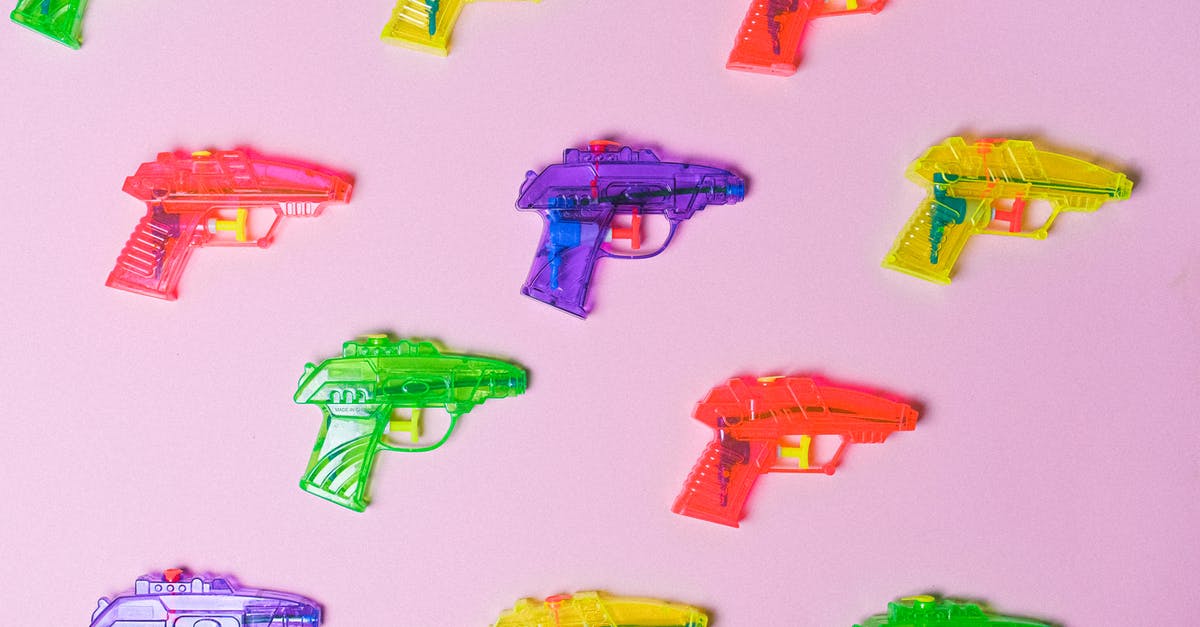 What difference do microwave power settings make for reheating food? - Top view of various multicolored toys for fight arranged on pink background as representation of game What difference do microwave power settings make for reheating food? - Top view of various multicolored toys for fight arranged on pink background as representation of game
