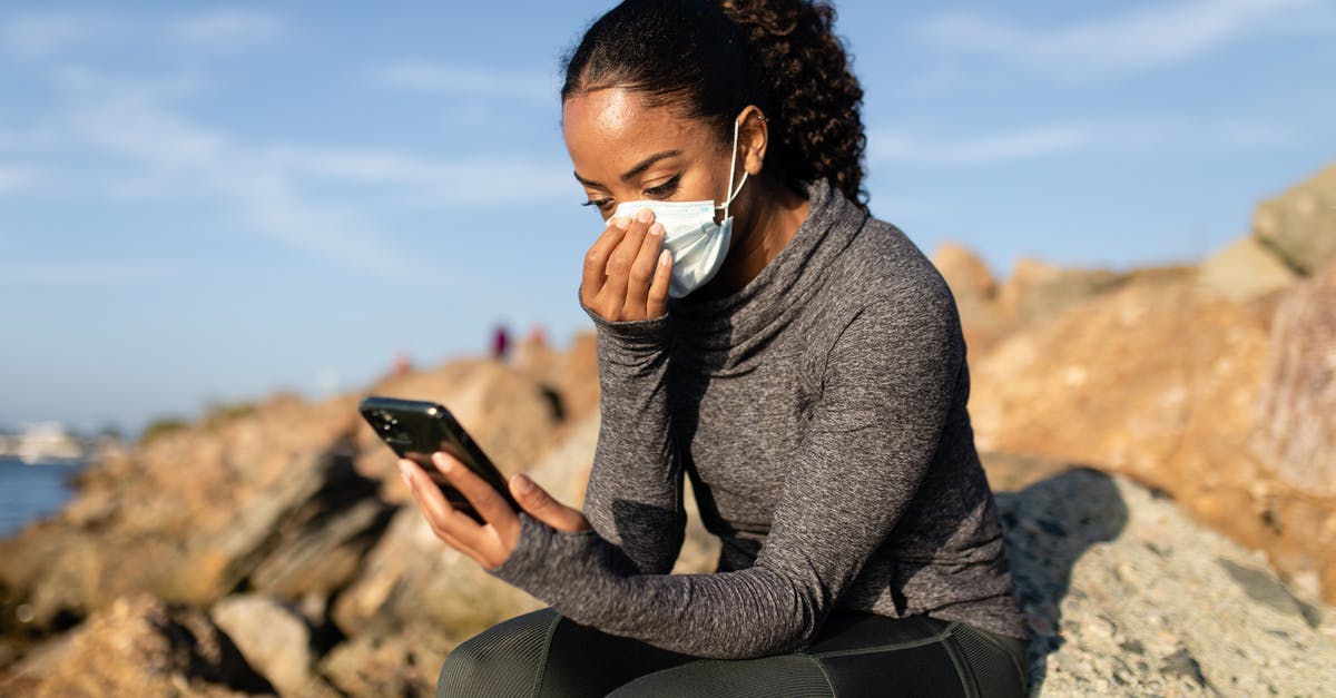 What difference would using Rock Sugar make in tea? - A Woman in a Face Mask Using her Cellphone while Sitting on a Rock What difference would using Rock Sugar make in tea? - A Woman in a Face Mask Using her Cellphone while Sitting on a Rock