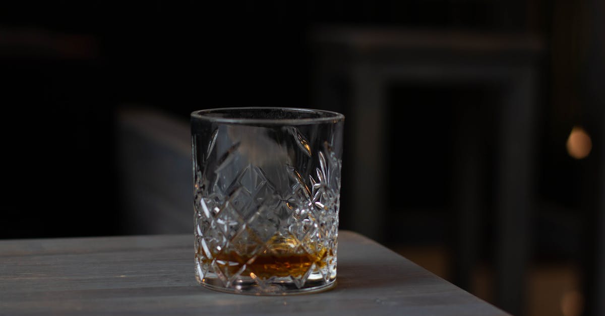 What does adding dark rum give to a fajita stir-fry? - Cut glass with aromatic cognac on bottom placed on wooden table in dark living room What does adding dark rum give to a fajita stir-fry? - Cut glass with aromatic cognac on bottom placed on wooden table in dark living room