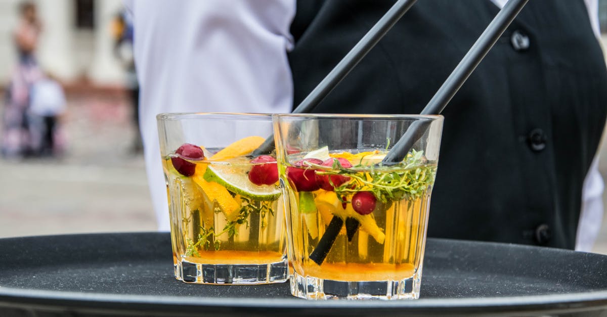What does Cranberry Compound mean? - 2 Whisky Glasses Filled With Beverage on Black Tray What does Cranberry Compound mean? - 2 Whisky Glasses Filled With Beverage on Black Tray