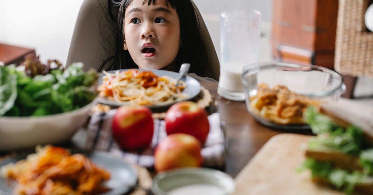 What does "shocking" food do? - Cute little girl having breakfast at home What does "shocking" food do? - Cute little girl having breakfast at home