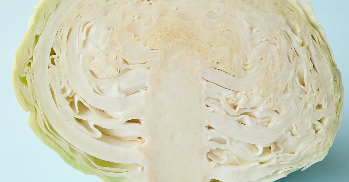 What does "wedge" mean, as in "wedge" a head of Cabbage? - Half of fresh juicy cabbage on blue surface What does "wedge" mean, as in "wedge" a head of Cabbage? - Half of fresh juicy cabbage on blue surface