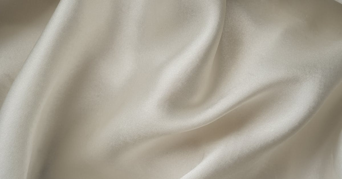 What does simmer slowly mean with white soybeans? - White Textile on White Table What does simmer slowly mean with white soybeans? - White Textile on White Table