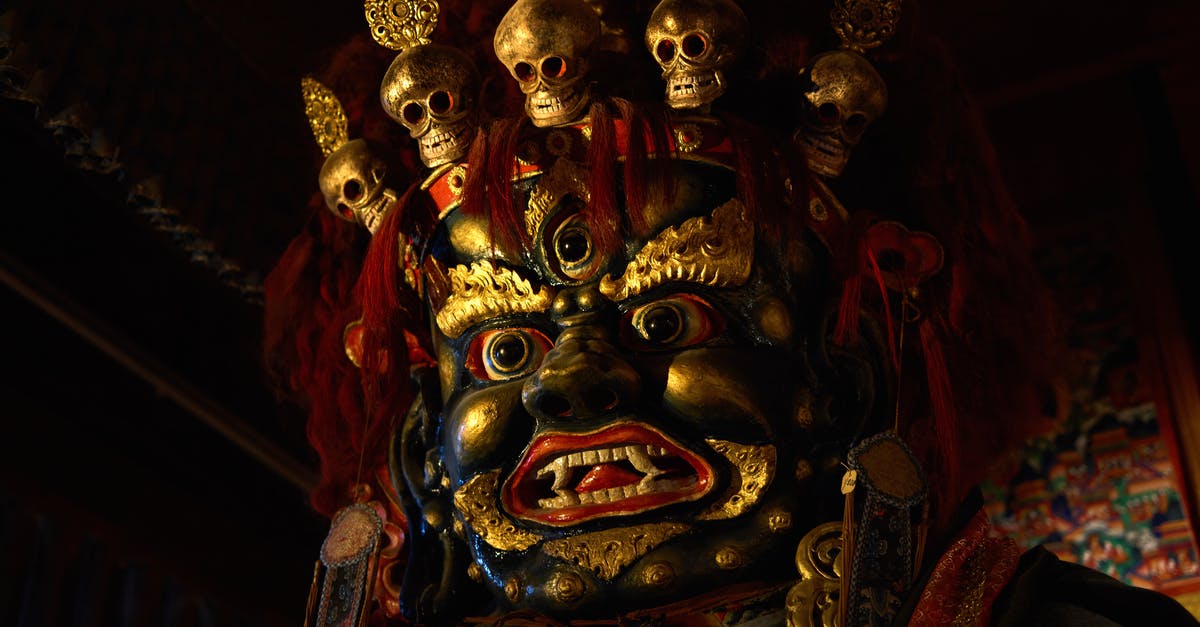 What does this function symbol on my Cylinda convection oven mean? - From below of Tsam mystery mask with gilded human face and third eye and pig nose and fangs among teeth and golden circles around face and full head of red hair decorated with red hairband adorned with golden skulls What does this function symbol on my Cylinda convection oven mean? - From below of Tsam mystery mask with gilded human face and third eye and pig nose and fangs among teeth and golden circles around face and full head of red hair decorated with red hairband adorned with golden skulls
