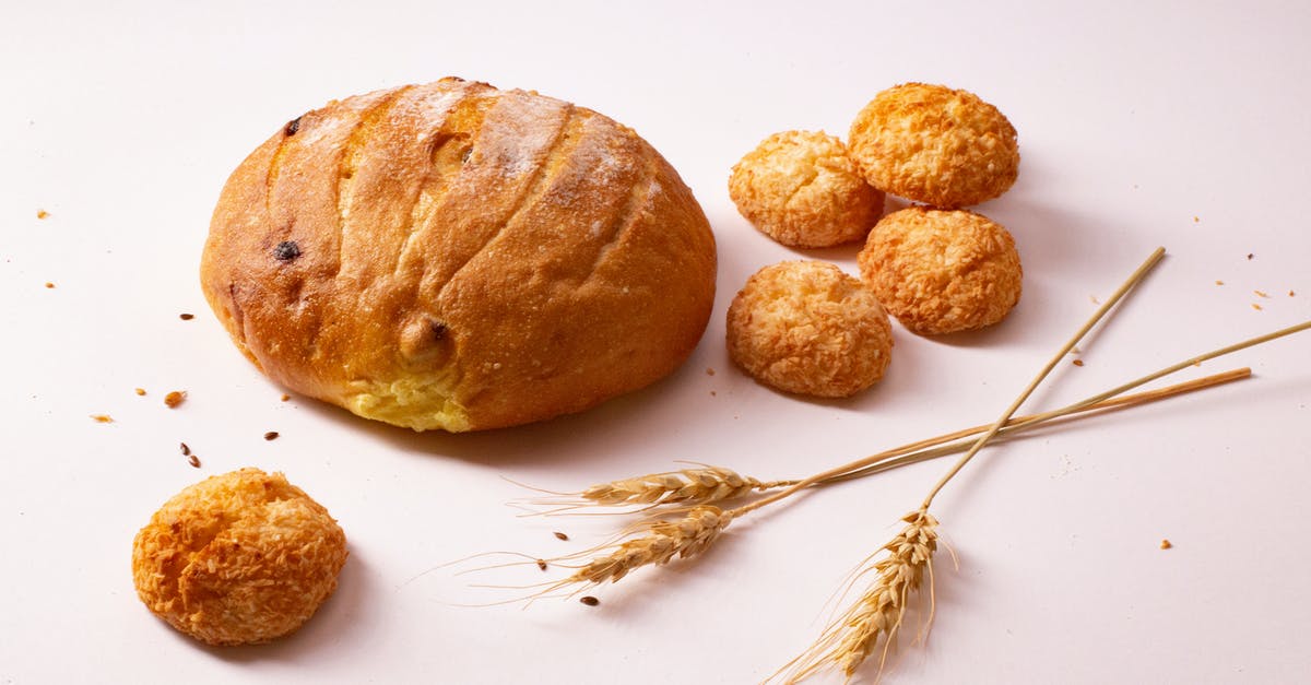 What does yeast do to flour? - Round Bread On White Surface What does yeast do to flour? - Round Bread On White Surface