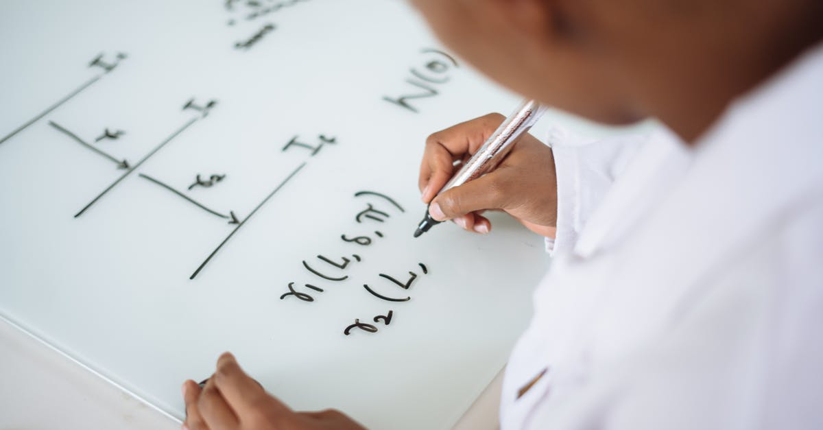 What equation should I use for microwaving food? - From above anonymous ethnic student wearing uniform and solving problem in chemistry while writing formula on white table in lab What equation should I use for microwaving food? - From above anonymous ethnic student wearing uniform and solving problem in chemistry while writing formula on white table in lab