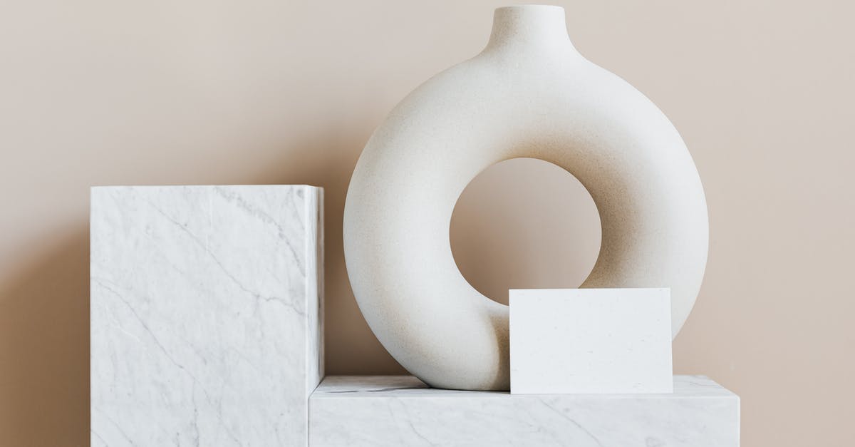 What exactly is 'osobaya sayanskaya' in House of Cards S03E03? - Composition of creative white ceramic vase in ring shape with empty postcard placed on white marble shelf against beige wall as home decoration elements or art objects