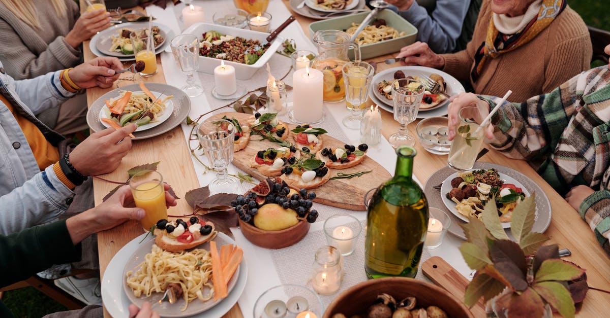 What factors affect collagen to gelatin conversion? - From above crop people enjoying festive dinner with snacks at garden table with candles burning What factors affect collagen to gelatin conversion? - From above crop people enjoying festive dinner with snacks at garden table with candles burning