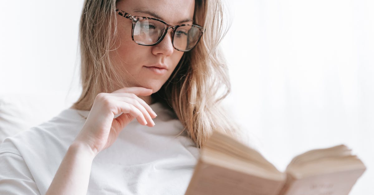 What factors to consider for a long lasting salad? - Low angle of crop concentrated female in eyeglasses touching chin while reading novel at free time What factors to consider for a long lasting salad? - Low angle of crop concentrated female in eyeglasses touching chin while reading novel at free time