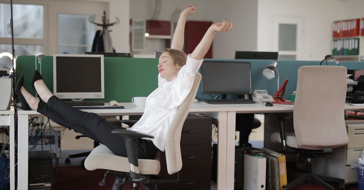 What flavors work well within a splenda-sweetened strawberry-rhubarb cobbler? [closed] - Side view of cheerful female employee in formal outfit sitting on office chair with crossed legs on desk and stretching while resting during work with closed eyes
