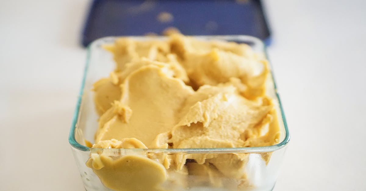 What gives Indian curries the sweet and creamy taste and fragrance? - Ice Cream on Clear Glass Container