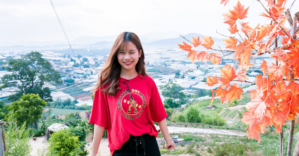 What gives Vietnamese Chicken the red tint? - Woman in Red T-shirt and Black Shorts What gives Vietnamese Chicken the red tint? - Woman in Red T-shirt and Black Shorts