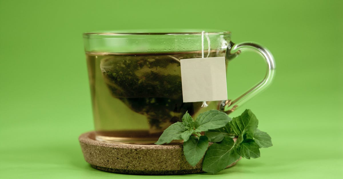 What green tea has the highest caffeine content? - Transparent cup of green tea with mint What green tea has the highest caffeine content? - Transparent cup of green tea with mint