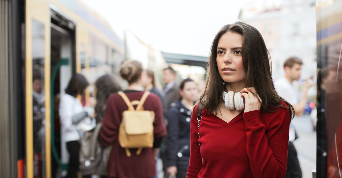 What happens when you reduce stock all the way? - Young woman standing on train platform What happens when you reduce stock all the way? - Young woman standing on train platform