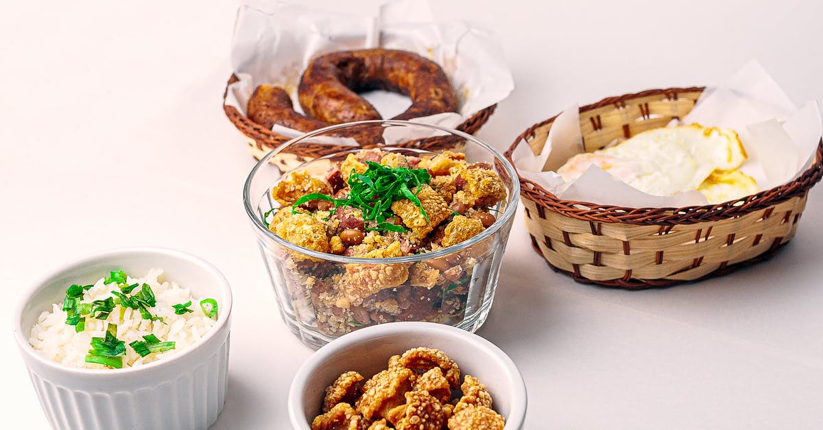 What ingredients can be used to make fried rice slightly sweet? - Tasty breakfast served in wicker and ceramic bowls What ingredients can be used to make fried rice slightly sweet? - Tasty breakfast served in wicker and ceramic bowls