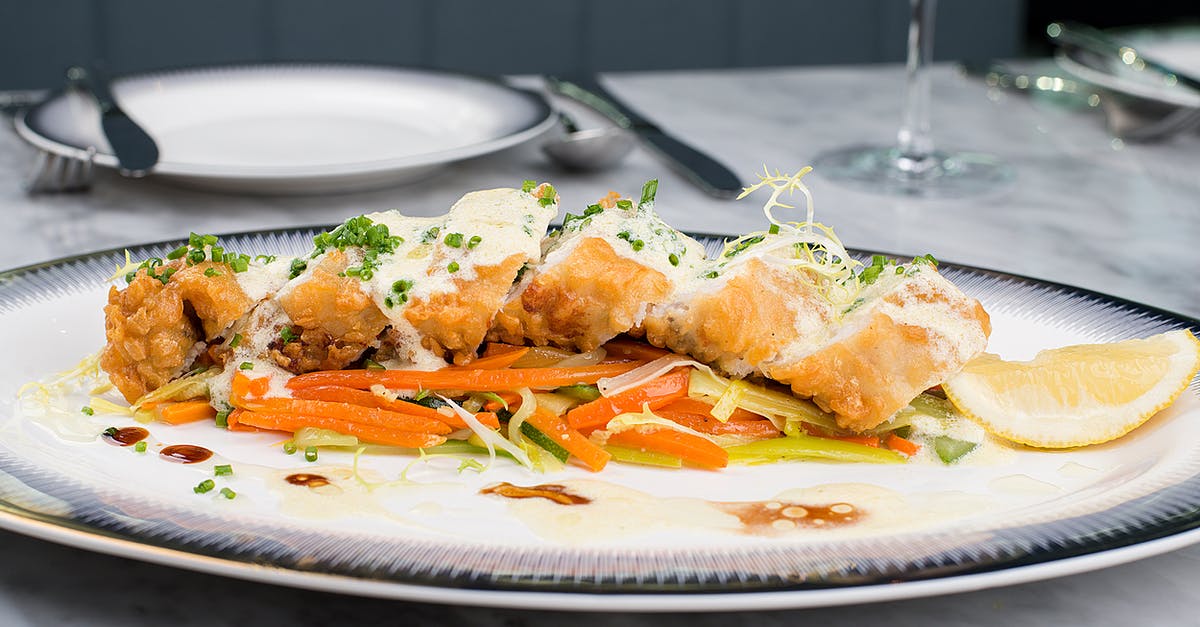 What is a good fish for cooking crumbed / battered? - White Ceramic Plate With Food What is a good fish for cooking crumbed / battered? - White Ceramic Plate With Food