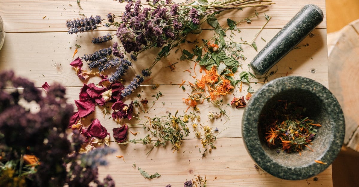 What is a good mortar and pestle crushing technique? - Purple Flowers on Brown Wooden Table What is a good mortar and pestle crushing technique? - Purple Flowers on Brown Wooden Table