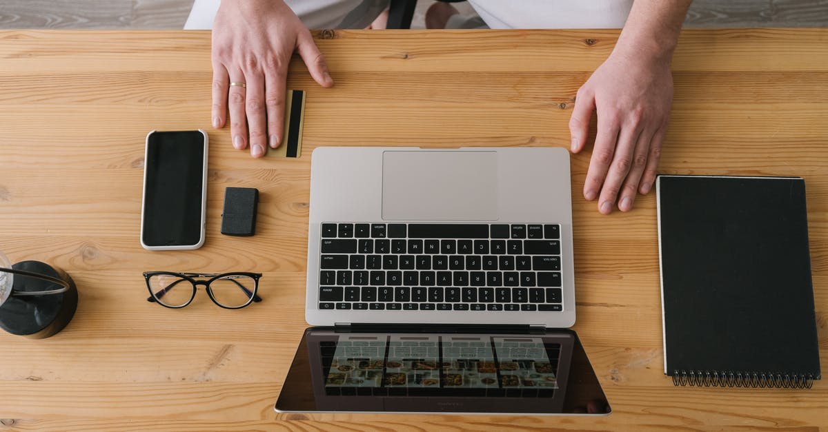 What is a good online resource for purchasing high quality sea salt? [closed] - Person Using Macbook Pro on Brown Wooden Table
