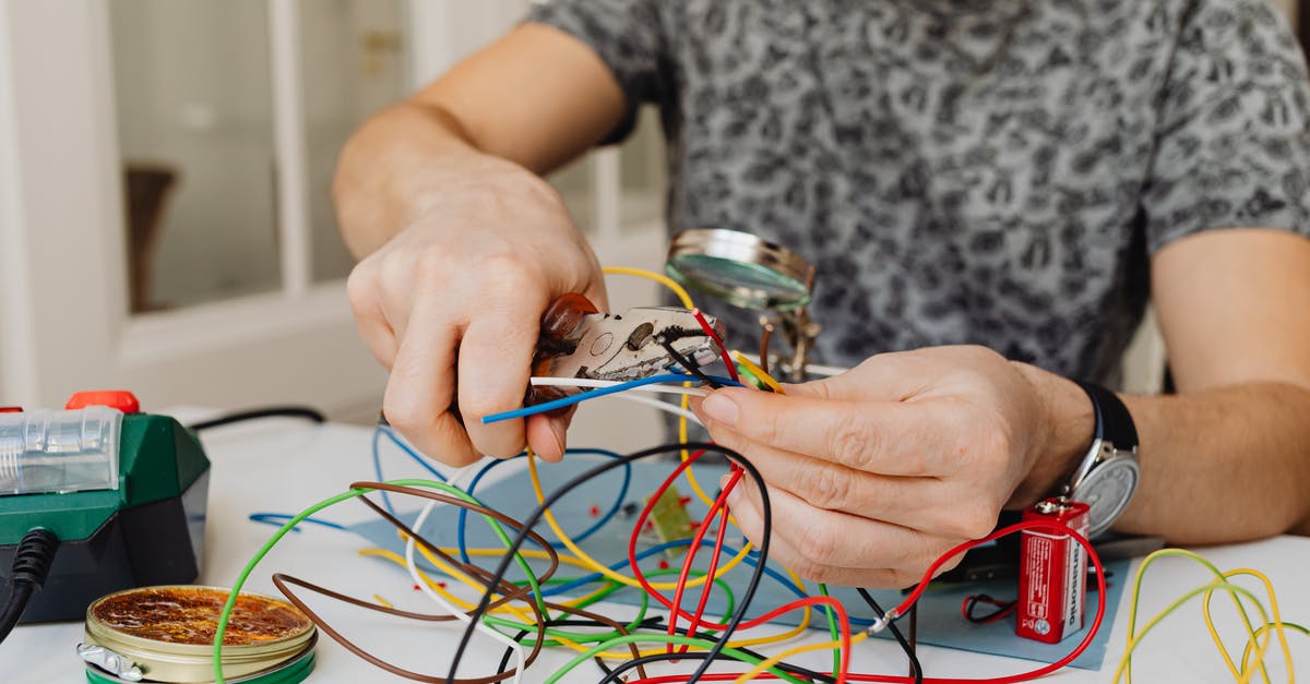 What is a julienne cut? - Photo of a Person's Hands Cutting a Green Cable What is a julienne cut? - Photo of a Person's Hands Cutting a Green Cable