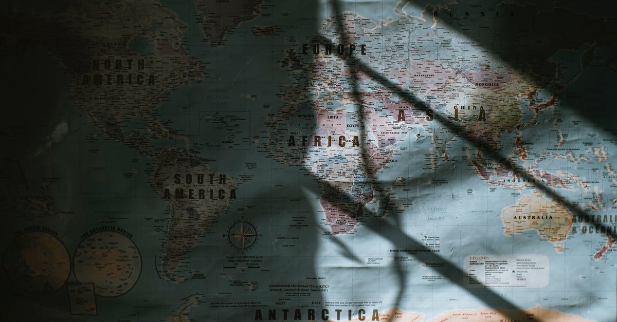 What is a “small cup” in Australia and/or old recipes? - Old world map placed on wall
