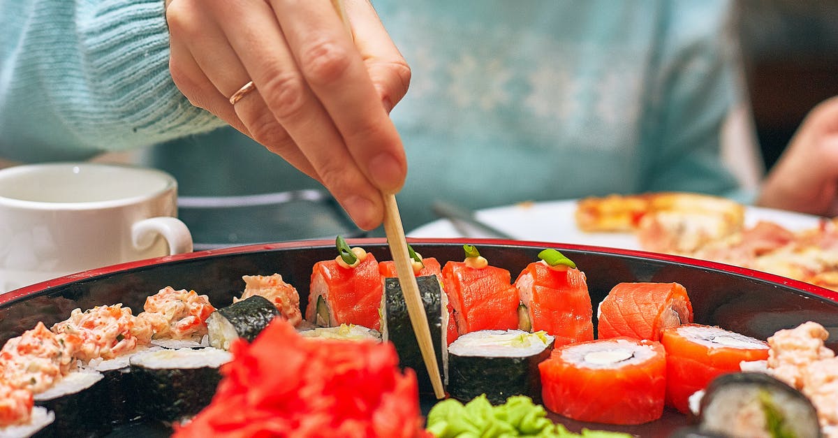 What is a suitable Low carb rice alternative? - Person Holding Brown Wooden Chopsticks What is a suitable Low carb rice alternative? - Person Holding Brown Wooden Chopsticks