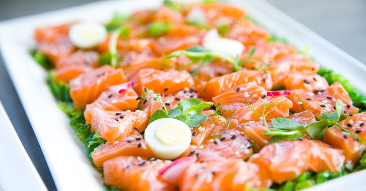 What is an elegant way to serve whole duck livers? [closed] - Salmon with greens and quail eggs on banquet table