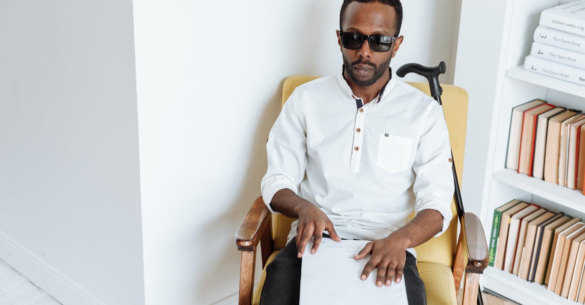 What is blind baking? - Man in White Dress Shirt Wearing Black Sunglasses Sitting on Brown Wooden Armchair What is blind baking? - Man in White Dress Shirt Wearing Black Sunglasses Sitting on Brown Wooden Armchair