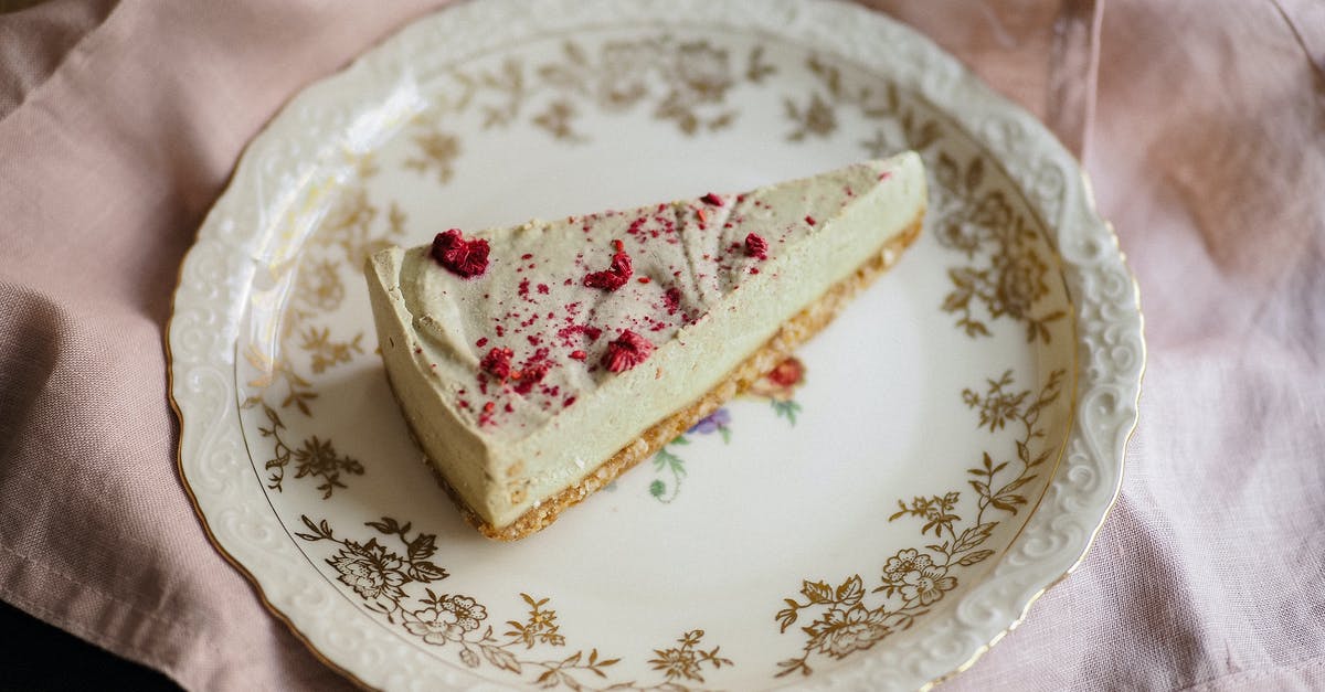 What is caster/castor sugar? - Cheesecake Triangle Sprinkled with Red Castor Sugar Laying on Ornamental Plate What is caster/castor sugar? - Cheesecake Triangle Sprinkled with Red Castor Sugar Laying on Ornamental Plate