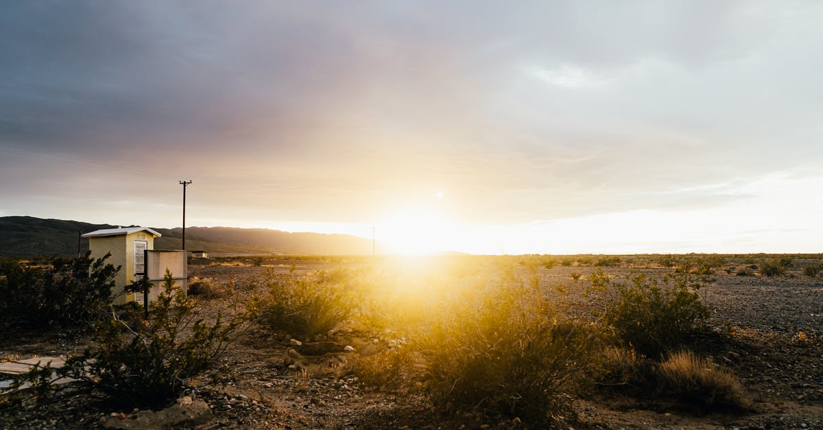 What is dry cottage cheese? - Bright sun shining over empty rural dirty field with small house during sunset on cloudy day What is dry cottage cheese? - Bright sun shining over empty rural dirty field with small house during sunset on cloudy day