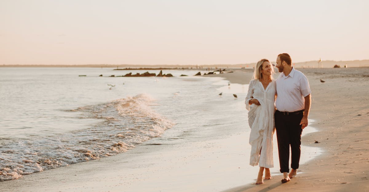 What is each side of a 4-sided grater for? - Man and Woman Walking on Beach