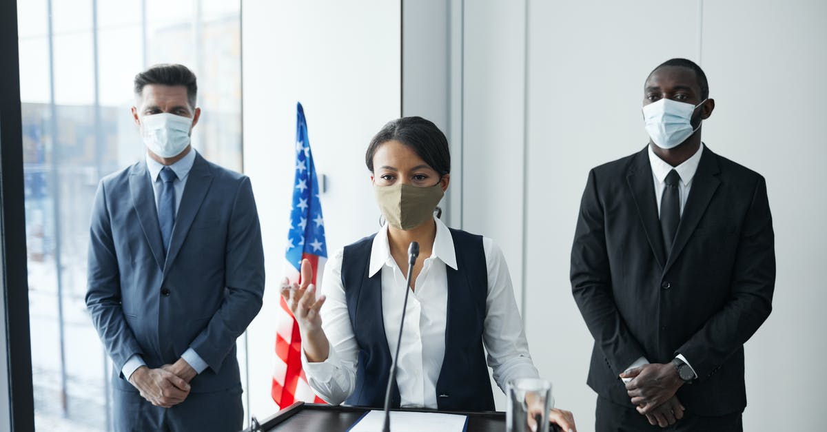 What is levure equivalant in America? - Man in Black Suit Jacket Holding Orange and White Stick What is levure equivalant in America? - Man in Black Suit Jacket Holding Orange and White Stick