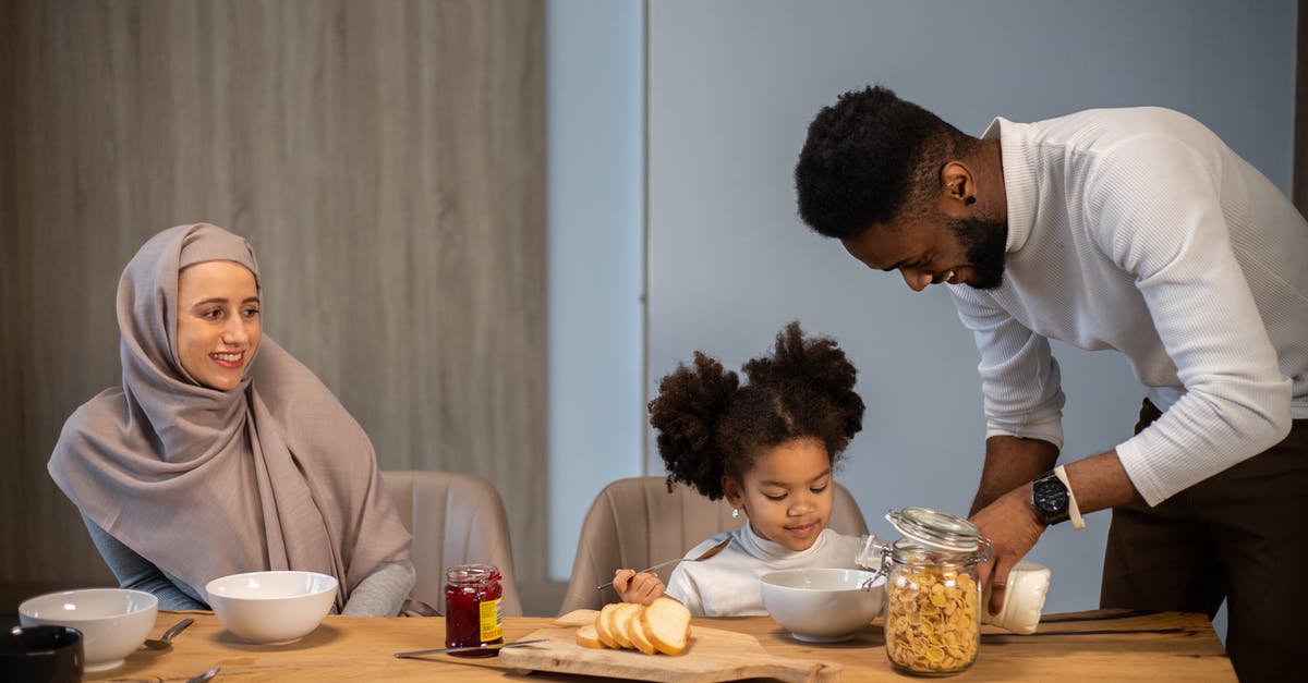 What is milk classified as once you pour it on cereal? - Glad family having breakfast at table What is milk classified as once you pour it on cereal? - Glad family having breakfast at table