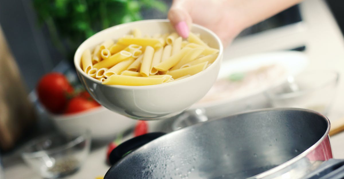 What is the benefit of a pasta pot with an inset? - Person Holding White Ceramic Bowl What is the benefit of a pasta pot with an inset? - Person Holding White Ceramic Bowl