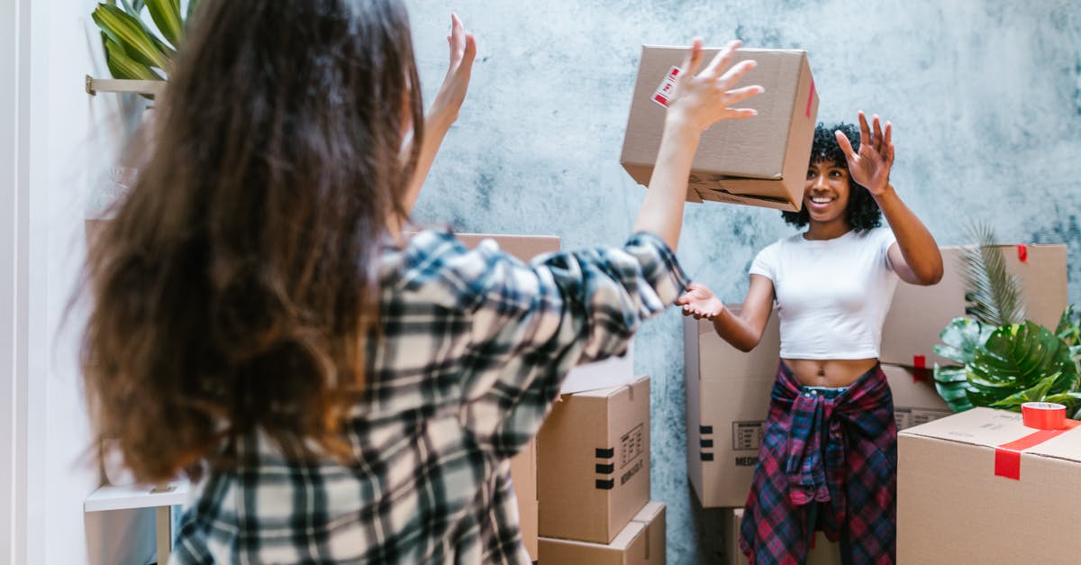 What is the best method of storage for condiments? - Woman Throwing Moving Box to Friend What is the best method of storage for condiments? - Woman Throwing Moving Box to Friend