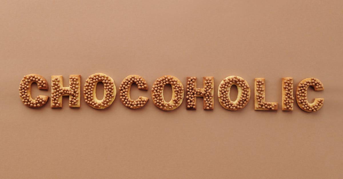 what is the best method to coat biscuits in chocolate - Photo Of Baked Cookies On Brown Background what is the best method to coat biscuits in chocolate - Photo Of Baked Cookies On Brown Background