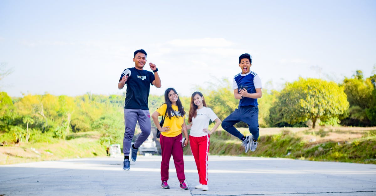 What is the best way to shred celery? - Happy Asian friends having fun together in park What is the best way to shred celery? - Happy Asian friends having fun together in park