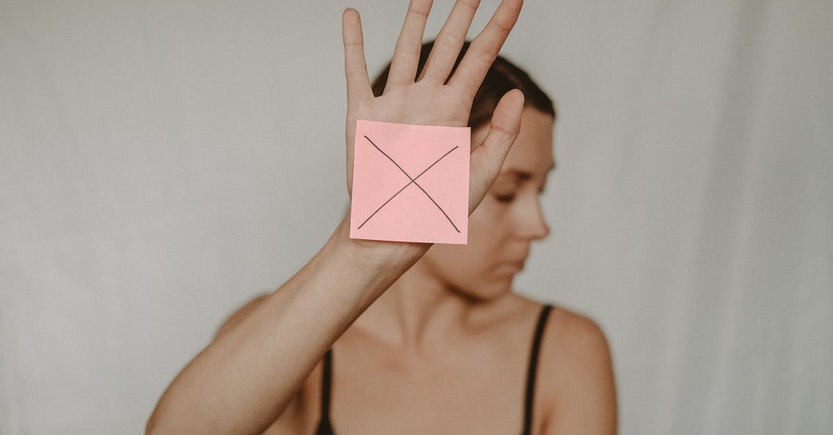 What is the danger in cross contamination? - Woman with paper with cross sign
